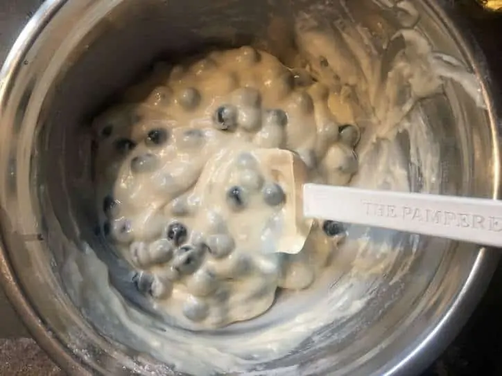 a photo of the mixed batter for BLUEBERRY MUFFINS WITH CRUMBLE TOP