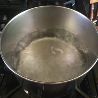 How To Speed Up Boiling Water On The Stove With Just A Pan