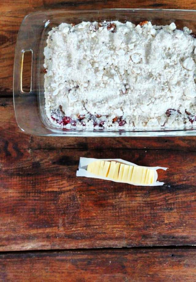 CHERRYS AND CAKE MIX IN THE PAN WITH BUTTER ON THE SIDE