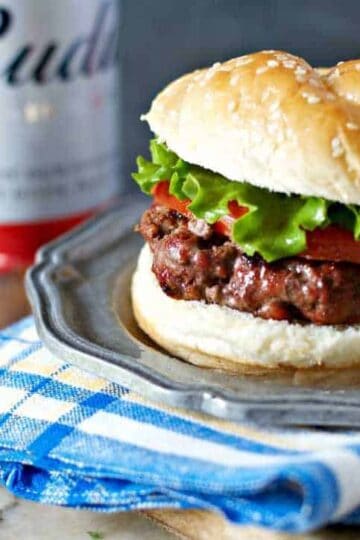 Hamburger on hamburger bun with lettuce and tomato