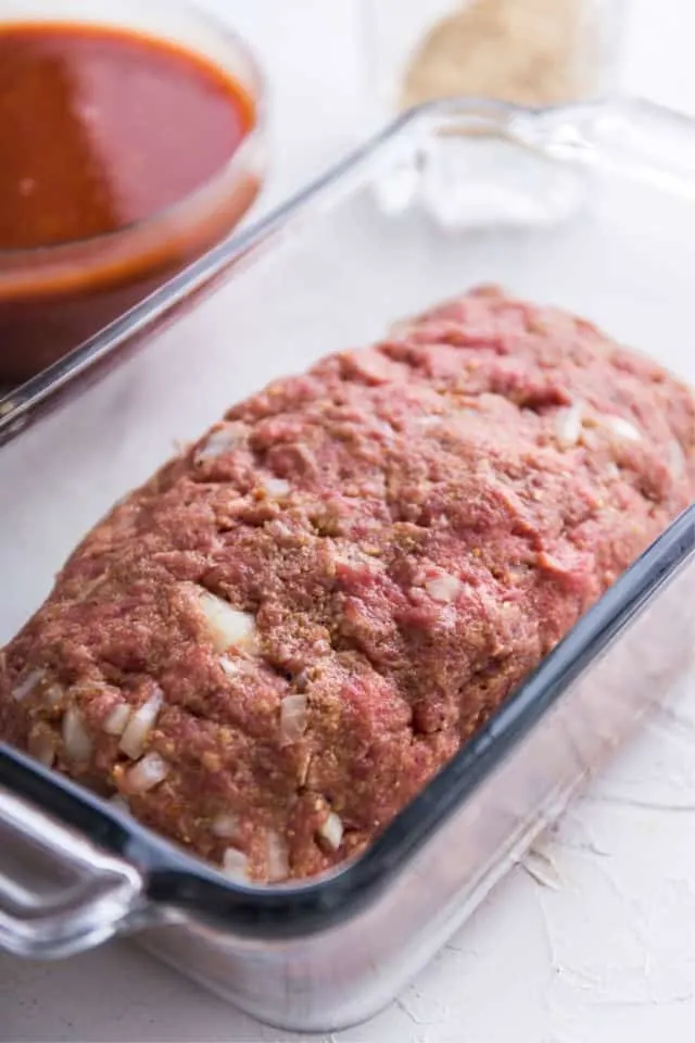 The loaf formed in the pan for tasty easy meatloaf