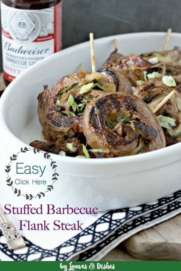 Easy and delicious meat cheese roll up for the grill using your favorite sauces, mushrooms, onions and spinach and veggies. #flanksteak #flanksteakrollup #meatrollup #grilling #grillingmeat #summerholiday #BudweiserSauce, #BudweiserBBQSauce, #KingOfSauces