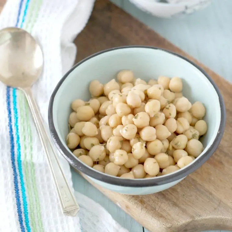A bowl of canned chick peas from the front
