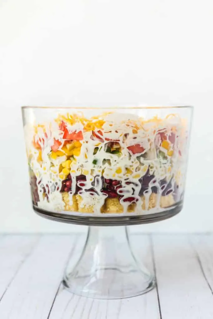 A photo of the side of the southern cornbread salad in the trifle bowl