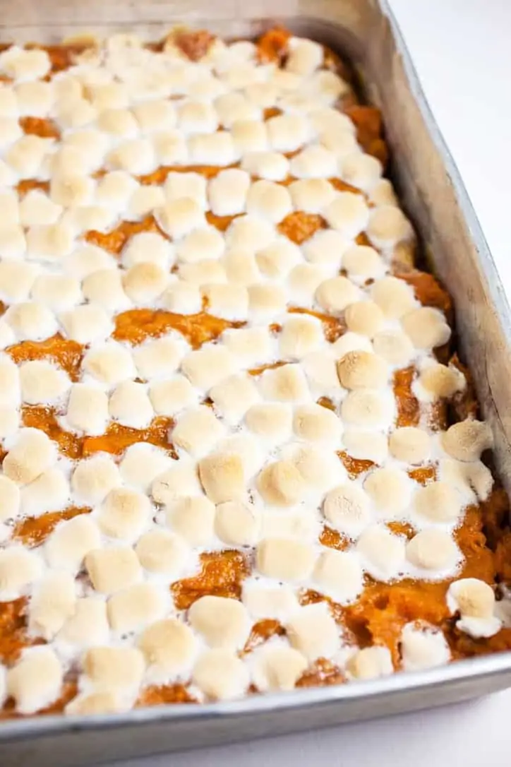 The top of the baked casserole with melted and browned marshmallows