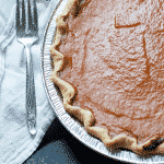 Homemade pumpkin pie recipe using pumpkin pie mix from the can. Canned pumpkin pie mix is easy to use. Just like Paula Deen or Pioneer Woman would make #recipe #thanksgiving #holidaybaking #pumpkinpie