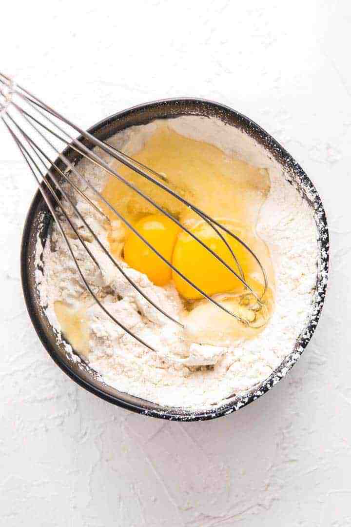 Mixing the ingredients for coconut custard pie