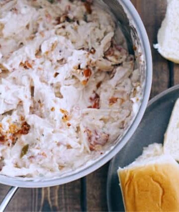 A bowl of White Trash Chicken Sliders ready for sandwiches