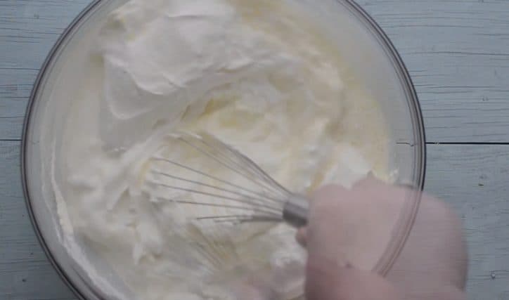 Ingredients for Southern Banana Pudding being whisked.