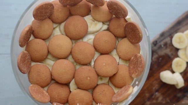 Vanilla Wafters layered on the top of a bowl of banana pudding