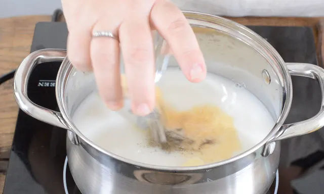 Adding some spices to the heating liquid for how to cook frozen corn on the cob
