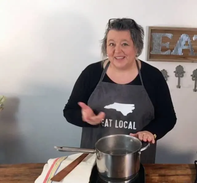 a photo of wendi saying to drain the beans once they have boiled for 2 minutes. 