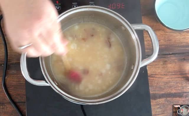 a photo of the boiling saucepan of hominy