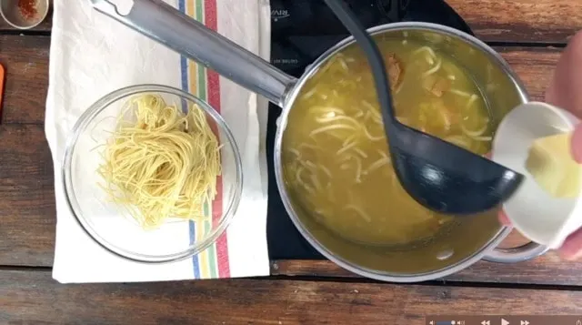 photo of adding butter to the soup