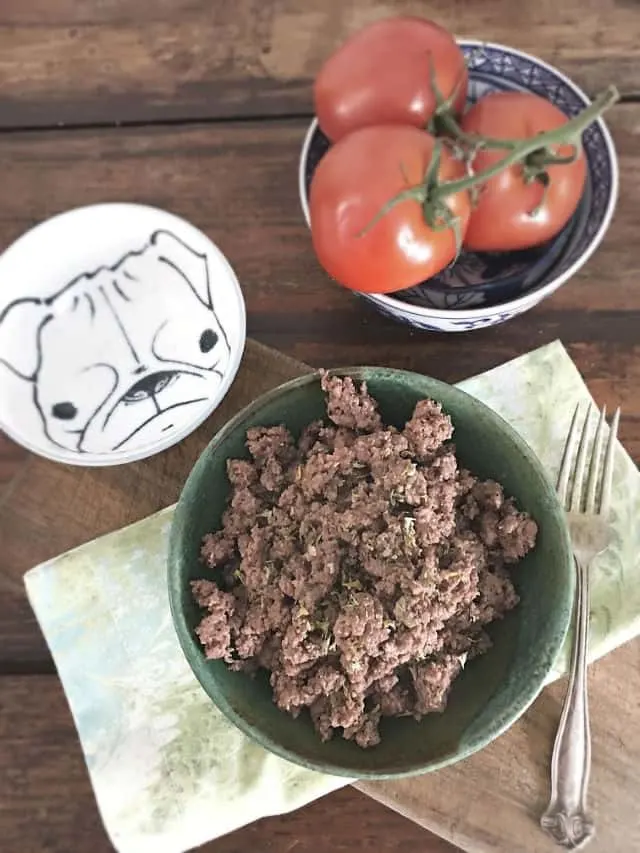ground beef in green bowl with green napkin