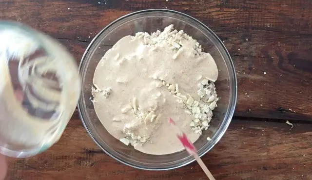 glass bowl of meat mixture and wet ingredients