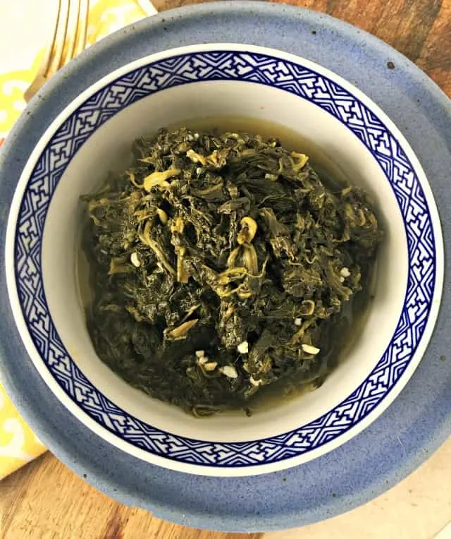 overhead view of a bowl of hot spinach