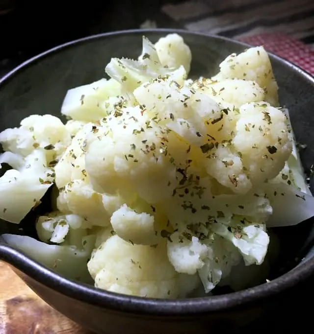 close up in a black bowl on cutting board