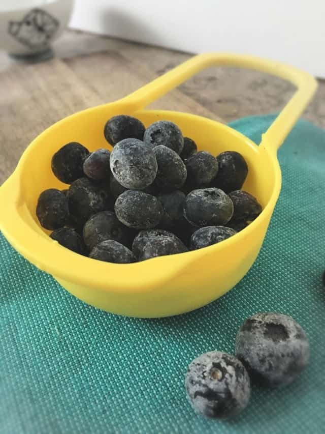 ½ Cup measure full of frozen blueberries