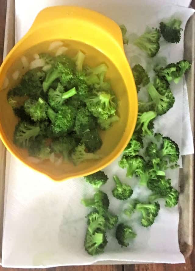 broccoli in ice bath and drying on towel