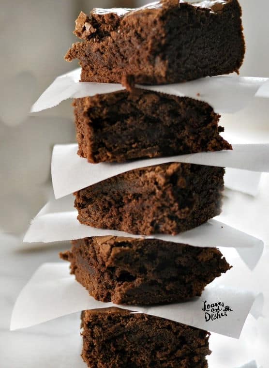 small batch brownies stacked on top of one another