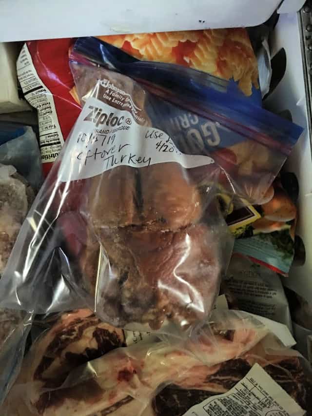 freezer bag of leftover turkey in freezer