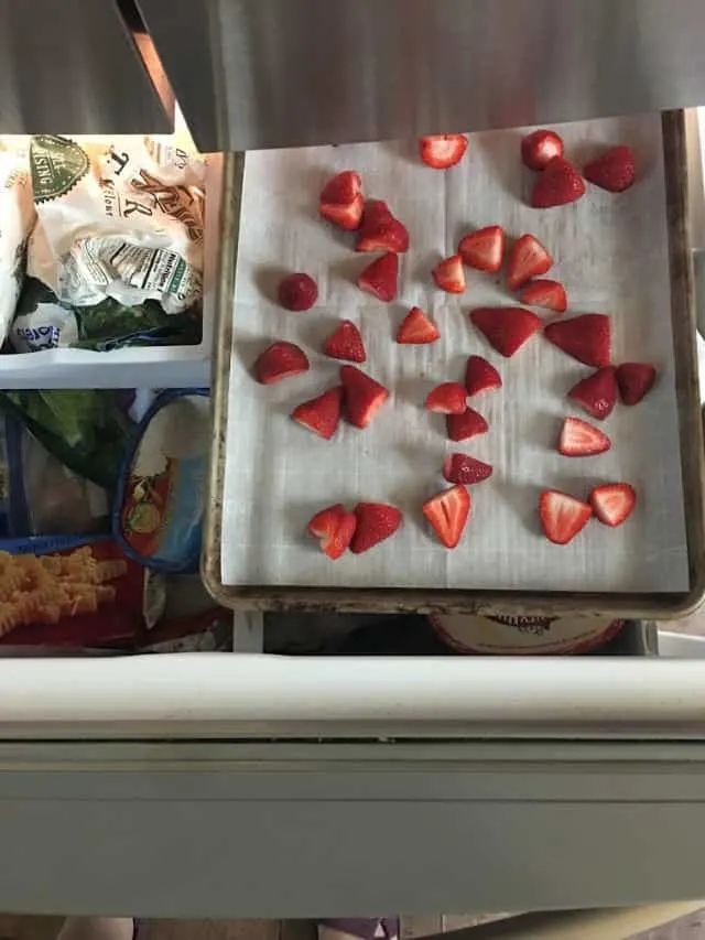 Strawberries in the freezer on a pan