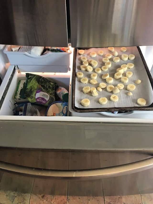 tray of banana slices in the freezer