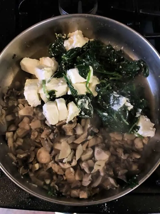 mushrooms, spinach, cream cheese in frying pan