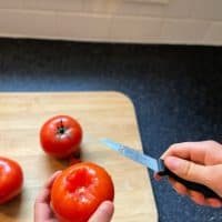 taking the stem off a tomato