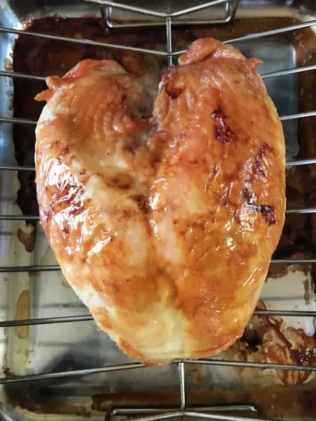 roasted turkey breast turned breast side up in pan