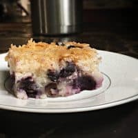 slice of blueberry cobbler on a plate