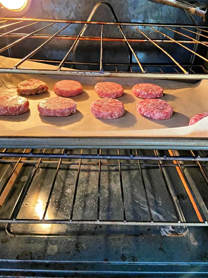 sausage patties on a tray in the oven