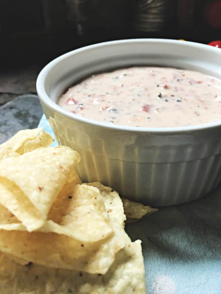 white bowl with tortilla chips and blue towel