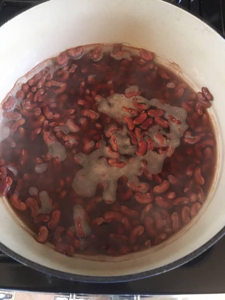dutch oven with water covering beans