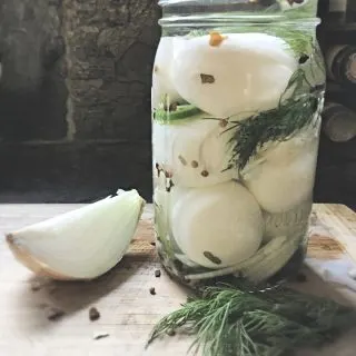 quart jar of spicy bar pickled eggs recipe with onion and dill