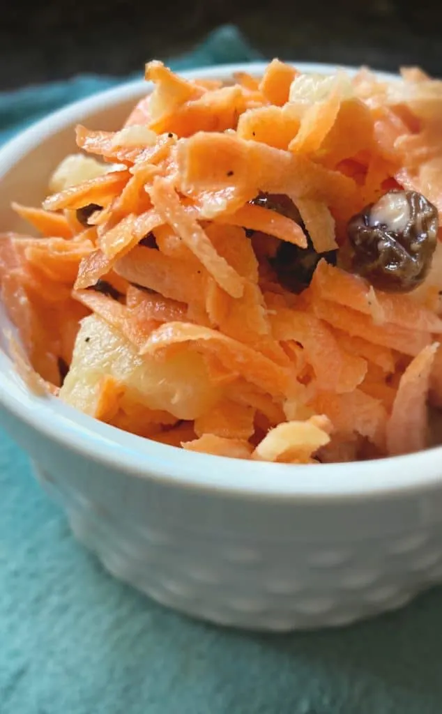 close up of carrot salad with raisins 