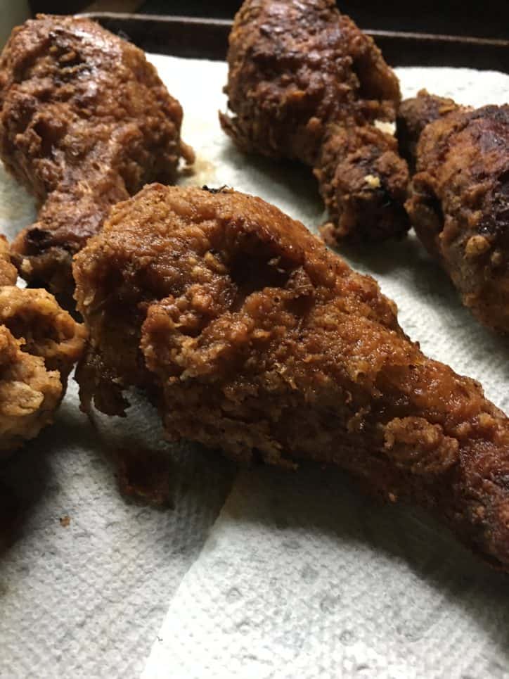 fried chicken leg on white napkin