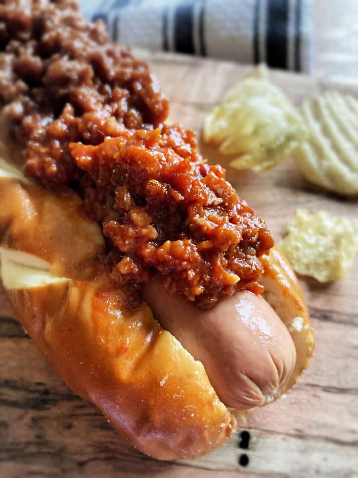 hot dog in bun with hot dog chili on top