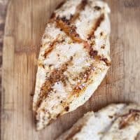 grilled chicken breast on board