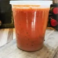 plastic container of soup