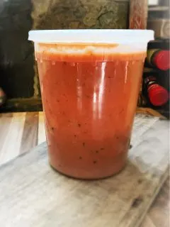 plastic container of soup