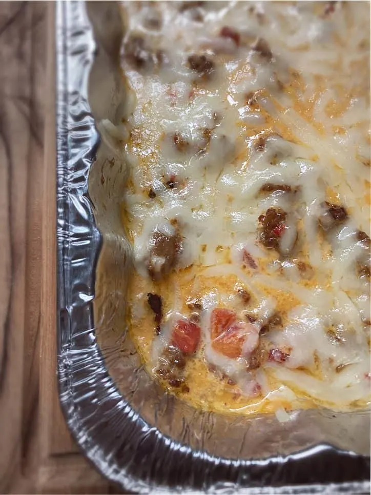 the corner of an aluminum pan with ingredients