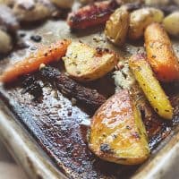 roasted carrots and potatoes on a pan
