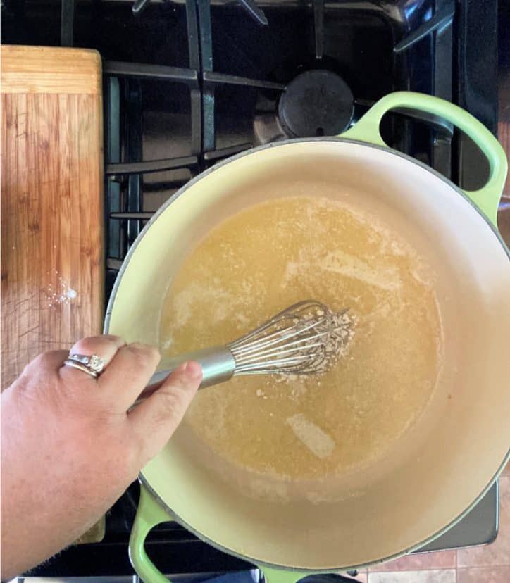 cast iron dutch oven with whisk