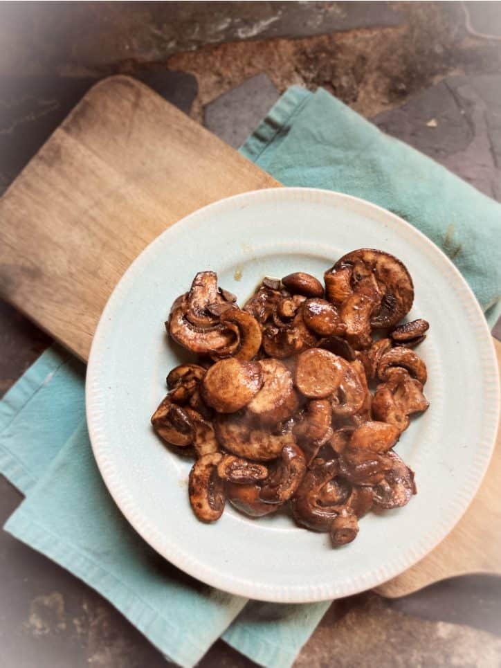 plate of mushrooms on cutting board