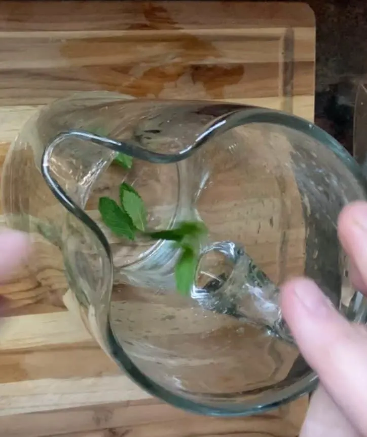 crushing mint leaves