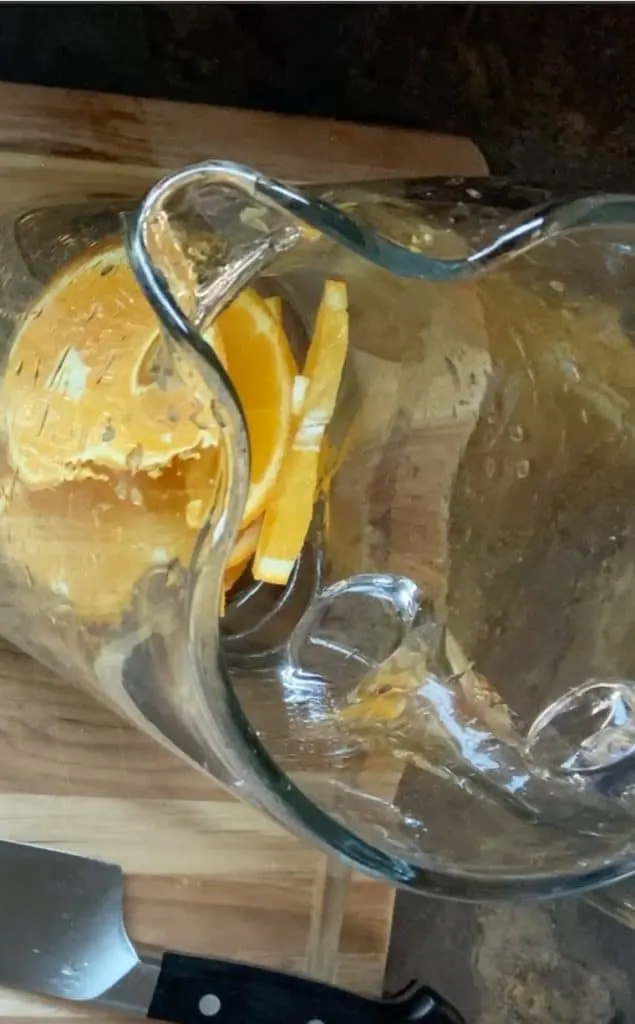 oranges in pitcher