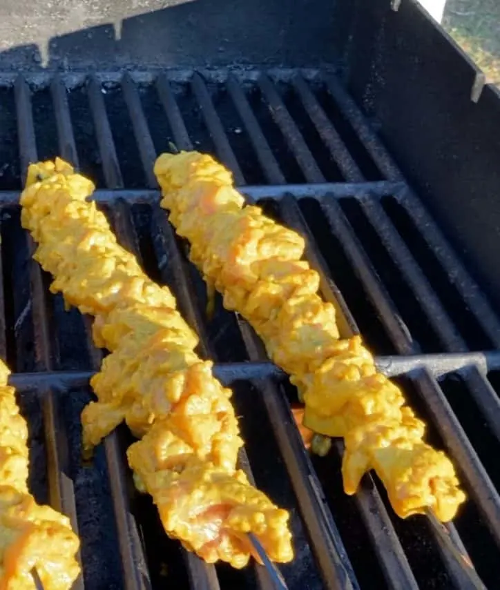 peanut sauce chicken skewers on grill