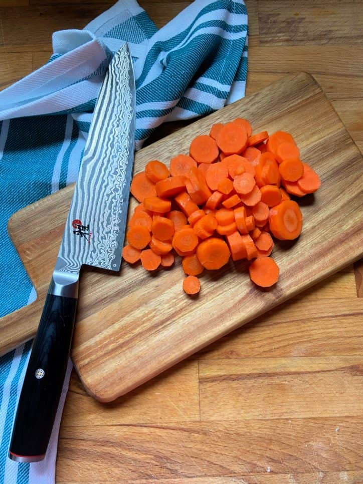 sliced carrots on cutting board
